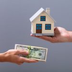 Cash and house keys exchanged in selling a house