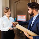 Expert Advice For Selling Your Home During The Holidays Woman purchasing home during holidays
