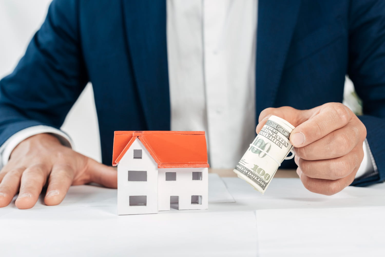 A home buyer offering cash for a house