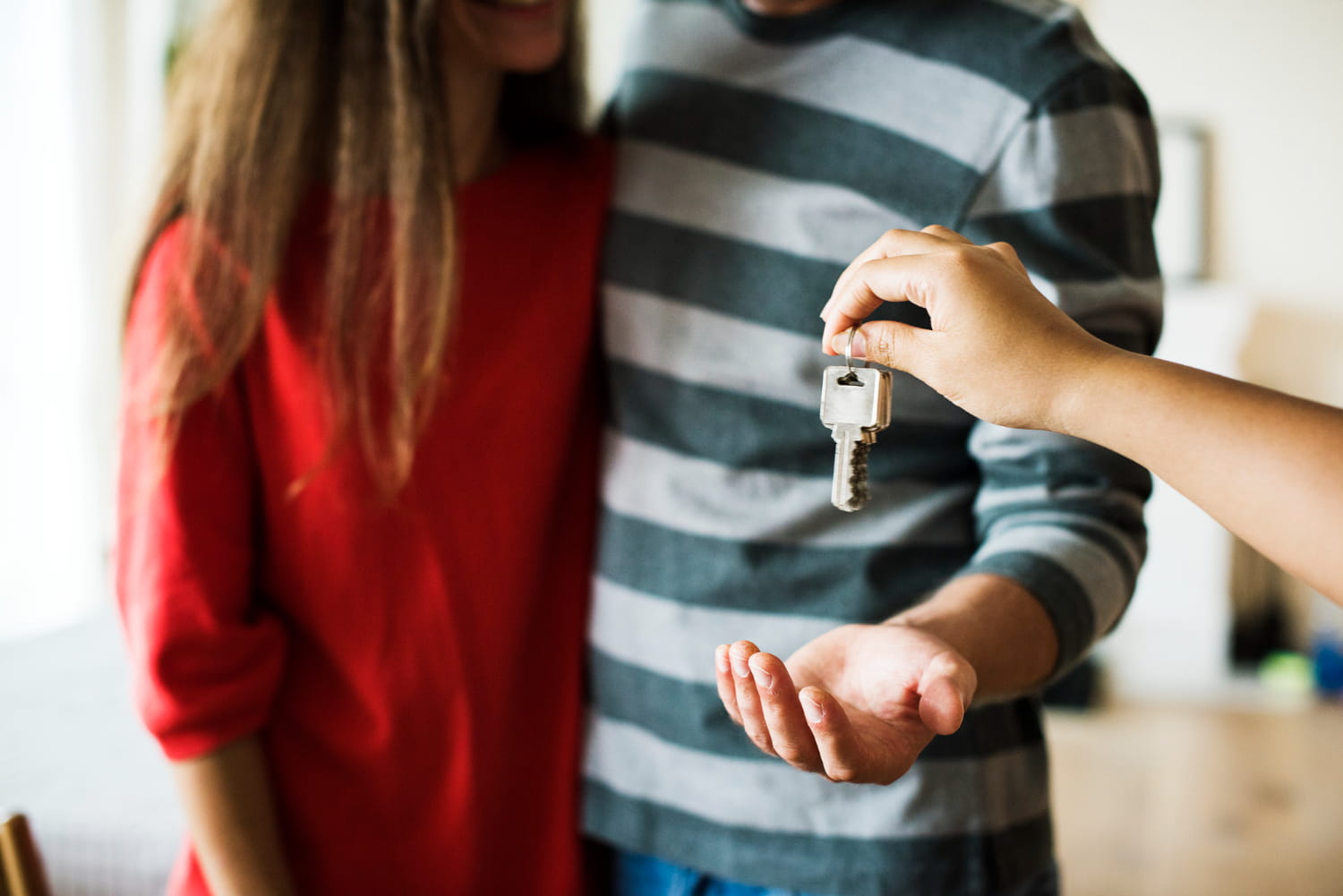 A couple buying a Spanish-style home