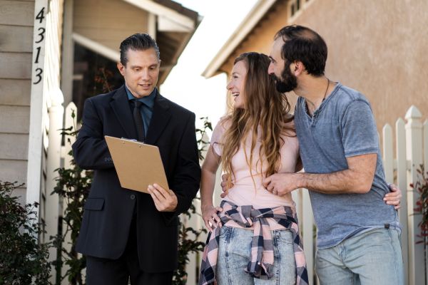 Buyers viewing pre-owned house listings