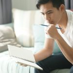10 Signs That You Should Sell Your Home Soon A man thinking about when he should sell his home
