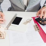 How Long To Keep Your Records After Selling The House? A man keeping his mortgage records after selling the house