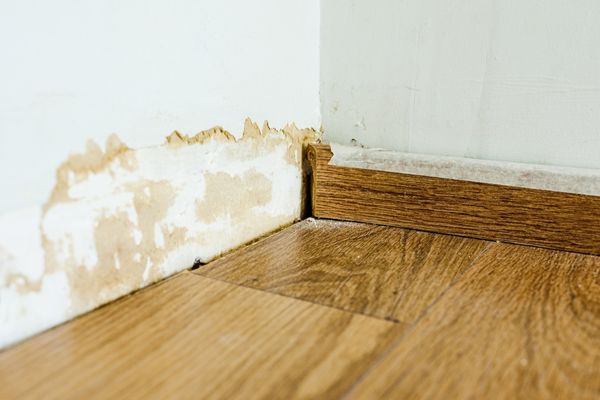 Damaged wall and flooring