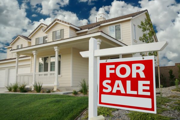 A house for sale during spring season.