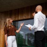 Selling A House As-Is: A Simple Guide Homeowner Showing Her House to Sell As-Is