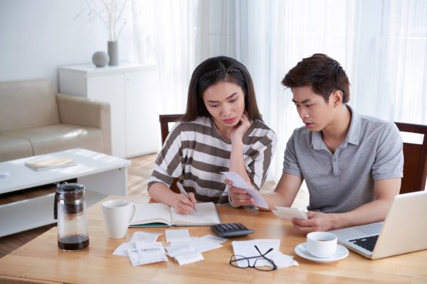 Couple Reviewing Their Salary for Home Buying Requirements