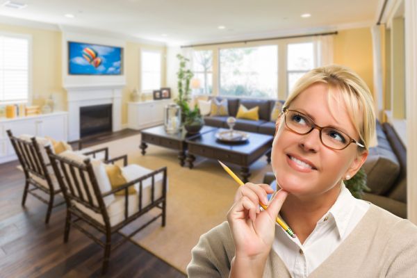 Woman preparing property for home sale