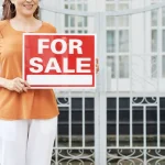 Taxes On Selling A House In Maine In 2026: Reduce Or Avoid Capital Gains Woman selling house in Maine